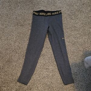 Nike Kids Pro Gray Leggings with Gold Accents